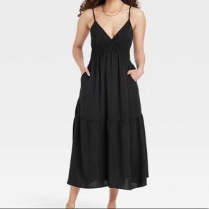 Black midi dress with pockets